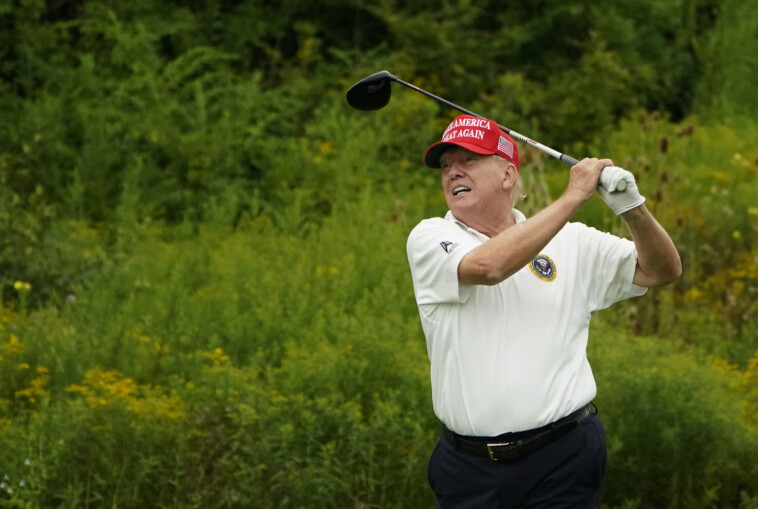 trump-interrupted-golf-game-to-convince-gop-holdouts-to-vote-for-house-speaker-mike-johnson,-lawmaker-says