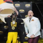 minnesota’s-pj.-fleck-gets-mayo-bath-from-surprise-guest-mascot-flavor-flav-in-surreal-bowl-moment