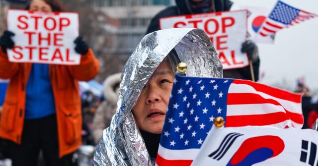 thousands-of-conservatives-rally-for-impeached-president-in-south-korea,-waving-us.-flags