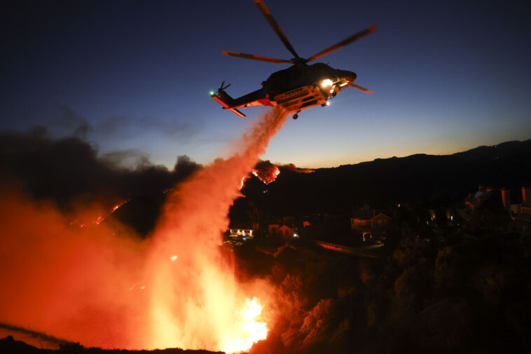 out-of-control-la-wildfires-force-residents — including-celebs — to-flee-in-terror:-photos