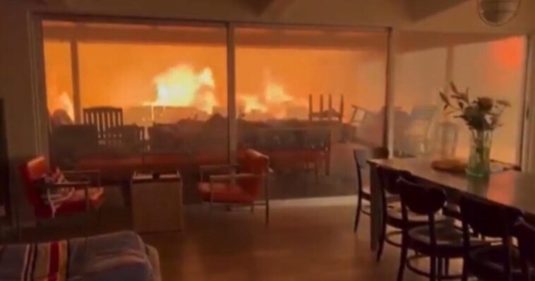 total-destruction:-apocalyptic-scenes-as-los-angeles-wildfires-rage:-wall-of-fire-surrounds-man-in-pacific-palisades-home-(video)