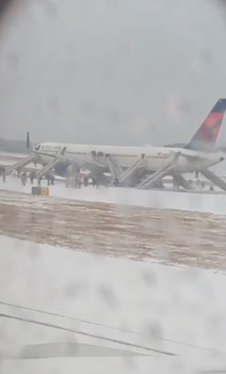 4-passengers-injured-as-hundreds-evacuate-delta-flight-by-emergency-slide-in-atlanta