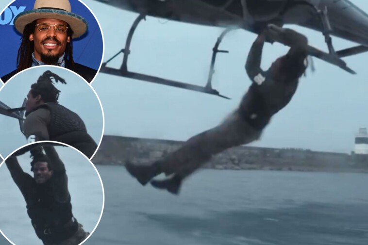 cam-newton-jumps-onto-moving-helicopter-from-speeding-boat-in-wild-reality-show-stunt