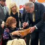 ‘living-legend’:-schumer-honors-centenarian-holocaust-survivor-with-capitol-flag,-senate-floor-recognition