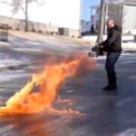 wild-video-shows-man-using-flamethrower-to-defrost-frozen-georgia-street