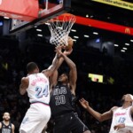 nets-battle-but-fall-to-heat-on-vince-carter’s-jersey-retirement-night