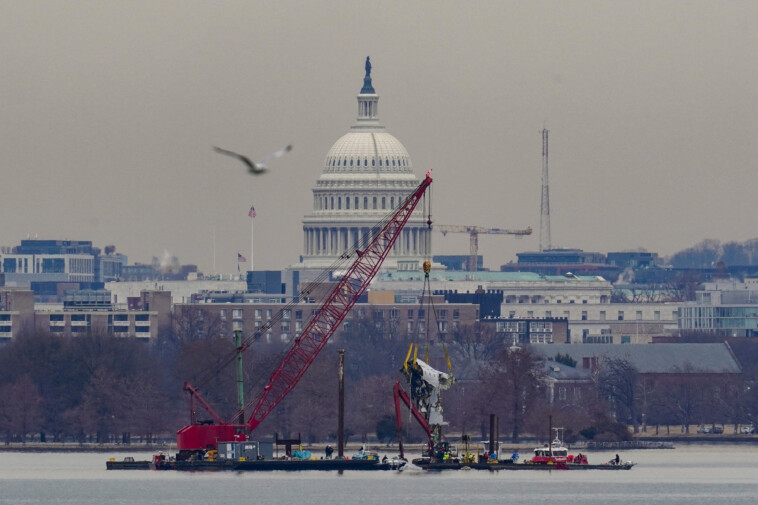 dc-plane-crash-wreckage-pulled-from-potomac-—-as-eerie-photo-shows-chopper-in-watery-grave