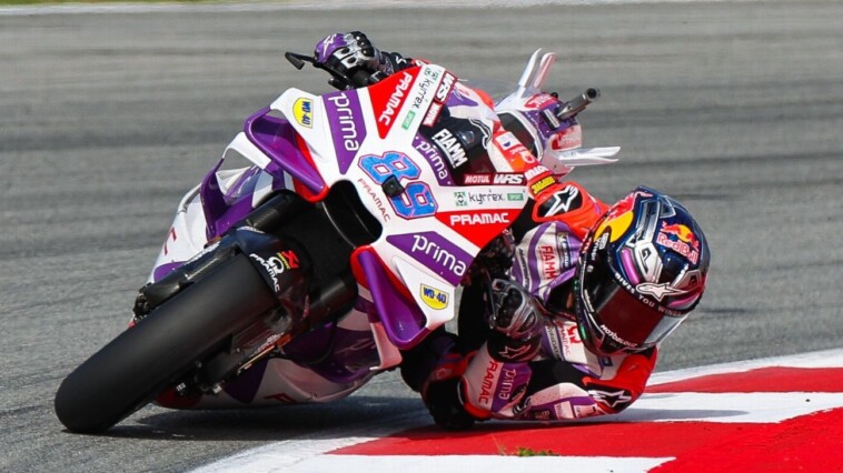 motogp-champ-soars-in-crash,-breaks-hand,-foot