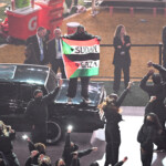 super-bowl-2025-protestor-apprehended-after-invading-halftime-show-with-palestinian,-sudanese-flags