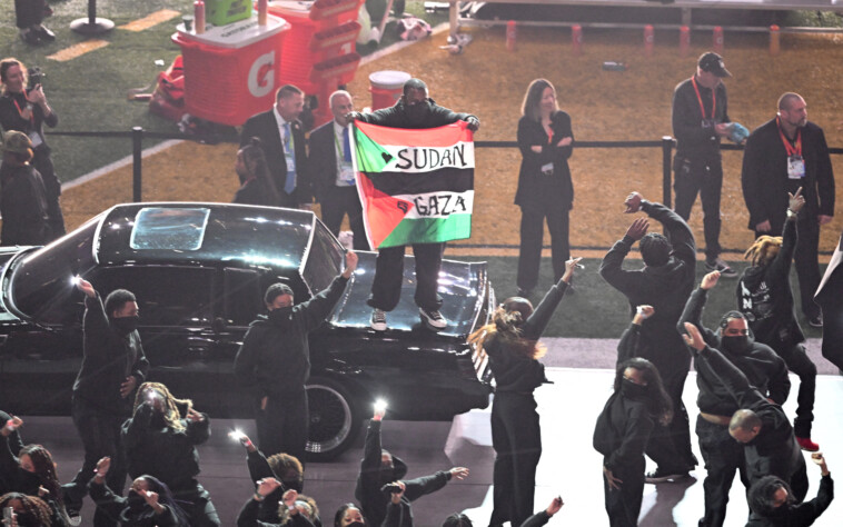 super-bowl-2025-protestor-apprehended-after-invading-halftime-show-with-palestinian,-sudanese-flags