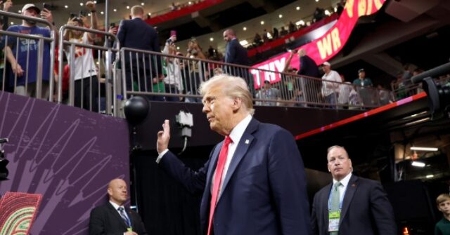 watch:-president-trump-greets-kc-defensive-lineman-chris-jones-on-the-field-at-super-bowl