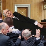 ailing-mcconnell-carried-into-senate-by-6-pallbearers