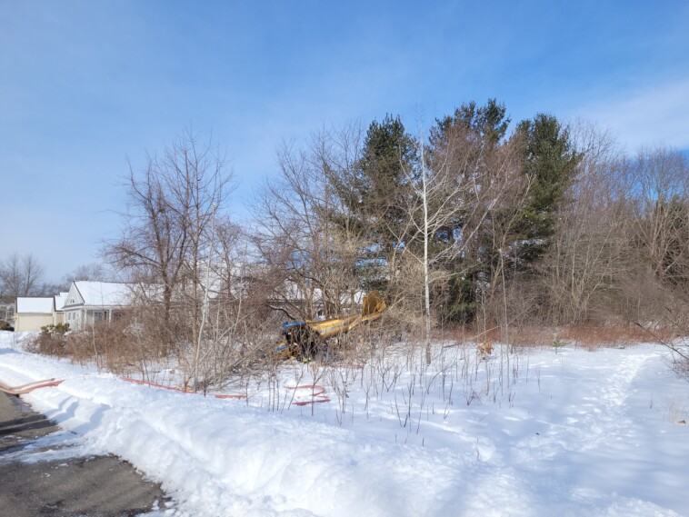 plane-caught-on-camera-crashing-into-new-england-neighborhood,-narrowly-missing-homes