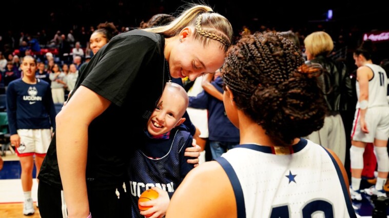 love,-abby:-the-forever-friendship-between-the-uconn-huskies-and-one-magical-fan