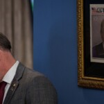 trump’s-mugshot-spotted-hanging-in-ornate-frame-near-oval-office