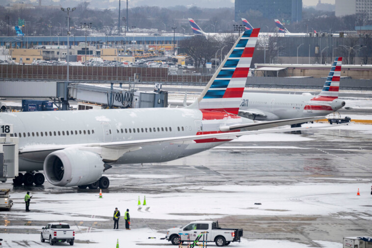 nearly-all-jfk-airport-flights-delayed-over-2-hours-as-winter-storm-causes-travel-misery-across-northeast,-midwest