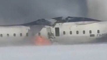 part-of-flipped-delta-plane-at-toronto-pearson-international-airport-ignites-just-as-firefighters-jump-out:-video