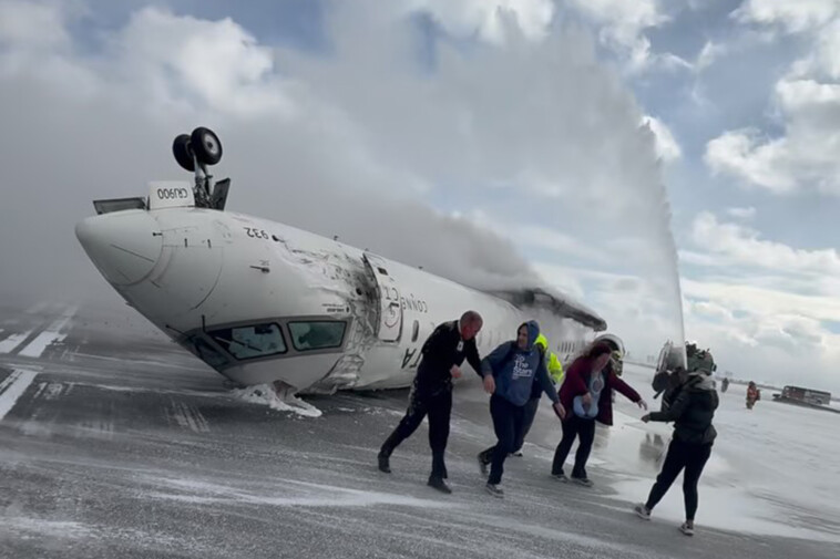 delta-plane-flipped-upside-down-after-‘extreme’-weather-—-including-20-inches-of-snow-at-toronto-airport:-officials