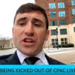 “they’re-kicking-out-j6ers-at-cpac!”-–-j6-prisoner-jake-lang-kicked-out-of-cpac-–-escorted-out-of-gaylord-hotel-–-the-entire-event-caught-on-video!