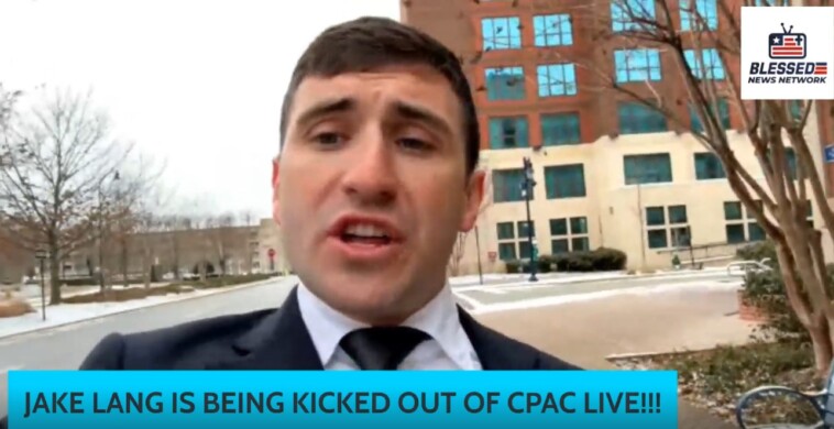 “they’re-kicking-out-j6ers-at-cpac!”-–-j6-prisoner-jake-lang-kicked-out-of-cpac-–-escorted-out-of-gaylord-hotel-–-the-entire-event-caught-on-video!