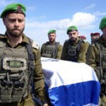 israel-receives-bodies-of-four-hostages-after-hamas-parades-them-by-cheering-crowds