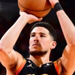 nba-all-star-devin-booker-pleads-for-hooters-to-stay-afloat-amid-bankruptcy-reports