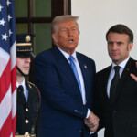 trump,-french-president-macron-engage-in-tug-of-war-handshake-at-white-house