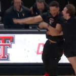 patrick-mahomes-celebrates-with-fan-who-sank-94-foot-putt-during-texas-tech-houston