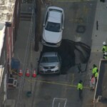 massive-sinkhole-swallows-car-of-police-officer’s-wife-–-but-he-shrugs-it-off-as-‘part-of’-living-in-philadelphia:-‘no-big-deal’