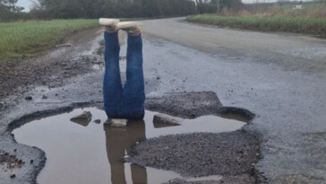 trouble-afoot!-man-fed-up-with-pothole-finally-gets-officials’-attention-with-puddle-diver-prank