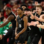 no-8-michigan-state-stuns-no.-16-maryland-on-half-court-heave-from-tre-holloman