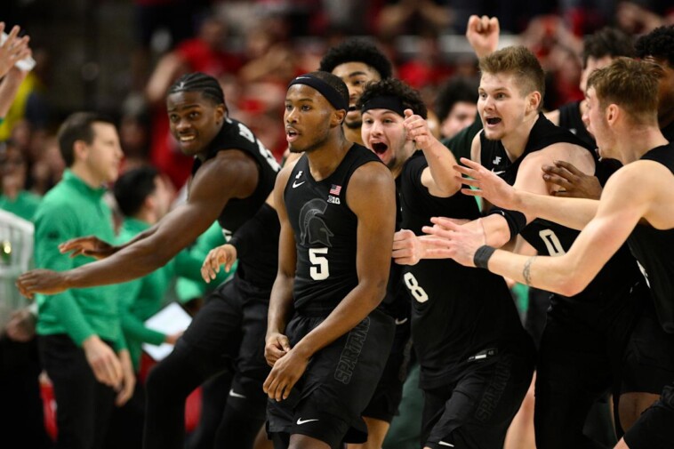 no-8-michigan-state-stuns-no.-16-maryland-on-half-court-heave-from-tre-holloman