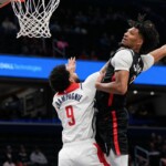 portland’s-shaedon-sharpe-enters-dunk-of-the-year-territory-with-wild-one-handed-slam-over-justin-champagnie