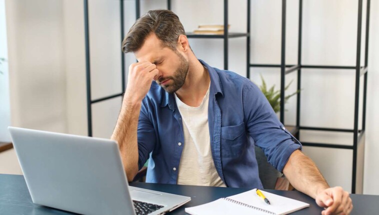 man-who-works-two-jobs-during-the-week-preparing-himself-for-chaotic-stressful-weekend-with-wife-and-kids