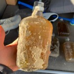 rare-and-mysterious-whiskey-bottles-found-washed-up-on-beach