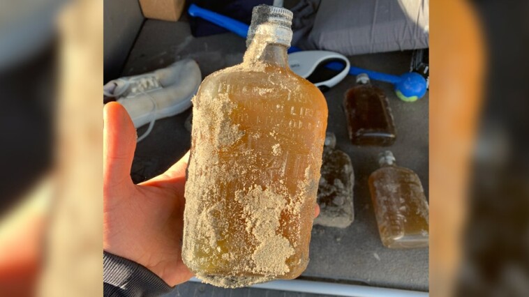 rare-and-mysterious-whiskey-bottles-found-washed-up-on-beach
