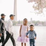 former-president-barack-obama-photobombs-family-taking-cherry-blossoms-pics-in-dc