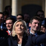 marine-le-pen-vows-‘i-won’t-give-up!’-as-thousands-rally-in-paris-against-election-ban