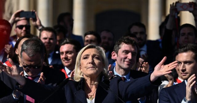 marine-le-pen-vows-‘i-won’t-give-up!’-as-thousands-rally-in-paris-against-election-ban