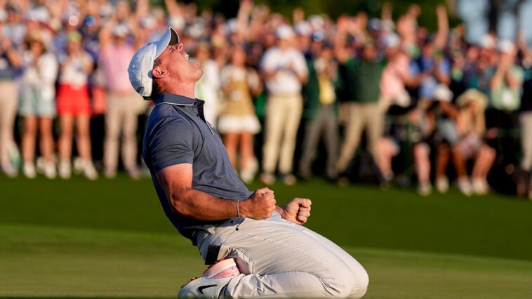 rory-mcilroy-beats-justin-rose-in-masters-playoff-to-win-green-jacket,-complete-grand-slam