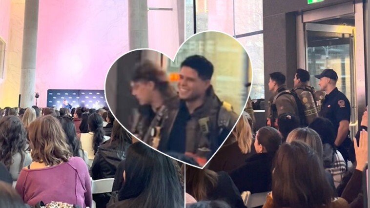 false-alarm,-real-heat:-firefighters-surprise-crowd-of-romance-novel-fans