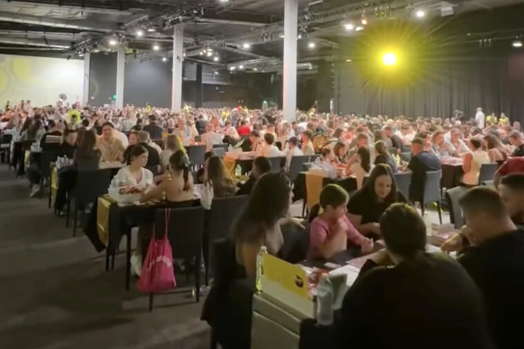 over-900-people-played-monopoly-to-honor-girl-who-died-and-loved-the-game,-setting-world-record