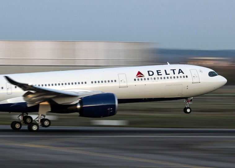 passengers-forced-to-evacuate-after-delta-jet-bursts-into-flames
