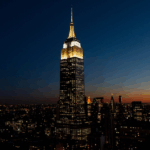 empire-state-building-shines-in-gold,-white-in-memory-of-pope-francis-after-pontiff’s-death