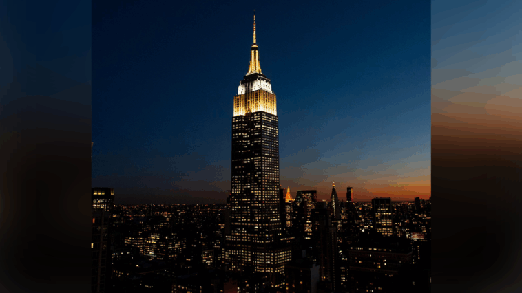 empire-state-building-shines-in-gold,-white-in-memory-of-pope-francis-after-pontiff’s-death