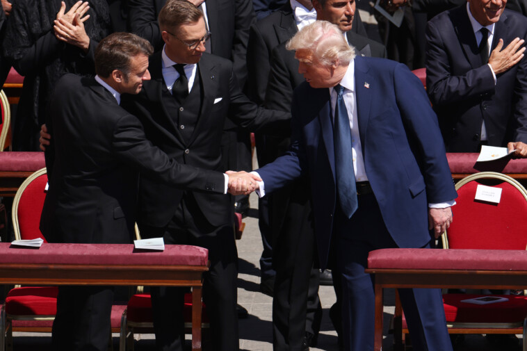 trump,-macron-exchange-firm-handshake-during-‘sign-of-peace’-at-pope-francis’-funeral