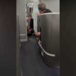 american-airlines-passenger-restrained,-knocked-to-floor-while-barging-into-cockpit:-video