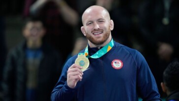 gold-medal-wrestler-charged-in-prostitution-sting