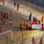 alleged-tren-de-aragua-gangbangers-in-ice-detention-hold-up-sign,-beg-to-be-deported