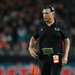 miami-coach-takes-mel-kiper-dig-after-espn’s-cam-ward-shedeur-sanders-draft-controversy